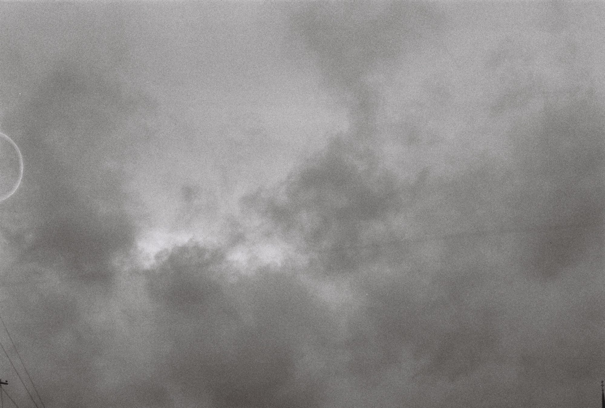 Grainy overcast sky with soft, heavy clouds