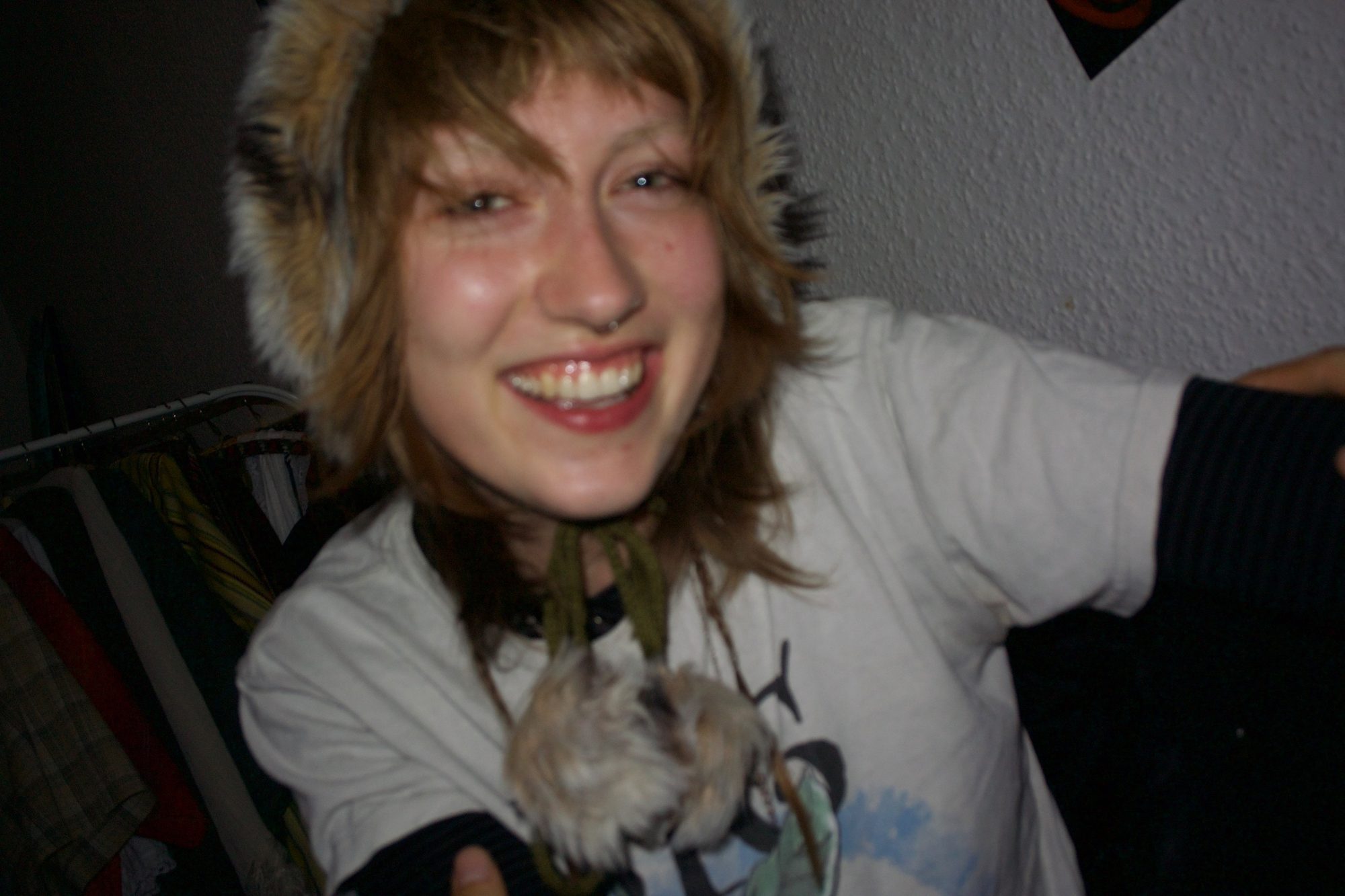 Close-up of her laughing in a fur hat